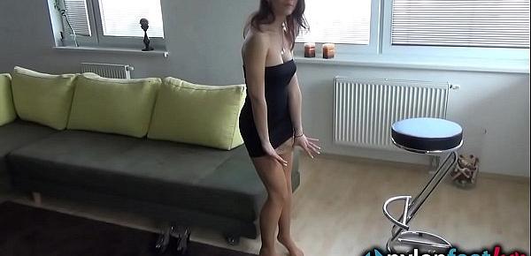  Hot brunette in tan pantyhose gives you a perfect feet show